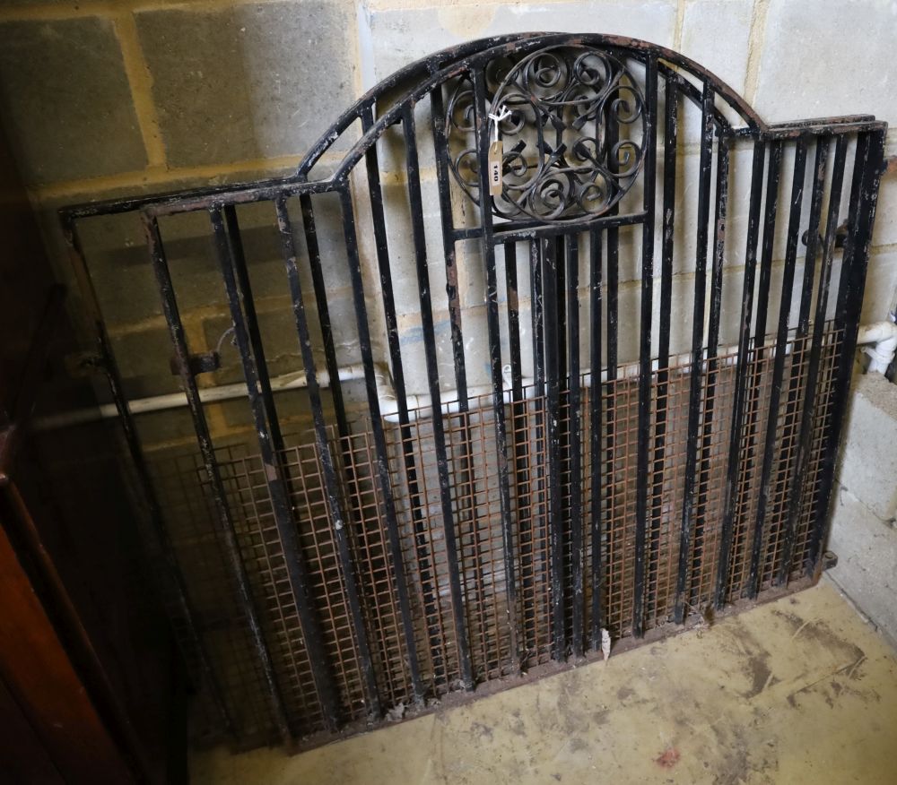 A pair of wrought iron gates, total width 234cm, height 112cm